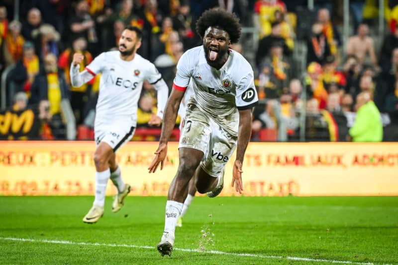 Nice's Terem Moffi celebrates scoring his side's third goal during the French Ligue 1 soccer match between RC Lens and OGC Nice at Bollaert-Delelis Stadium. Matthieu Mirville/ZUMA Press Wire/dpa