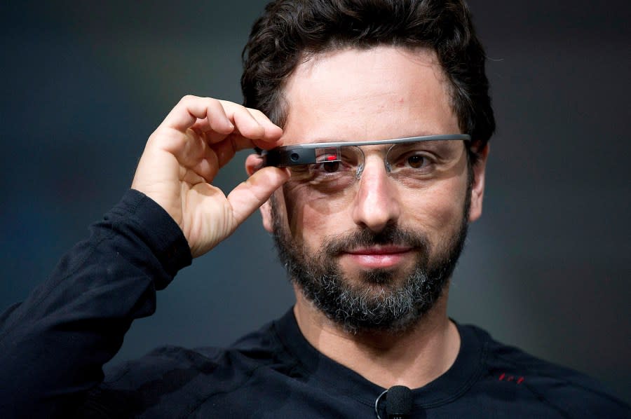 Sergey Brin, co-founder of Google Inc., wears Project Glass internet glasses while speaking at the Google I/O conference in San Francisco. (Photographer: David Paul Morris/Bloomberg via Getty Images)