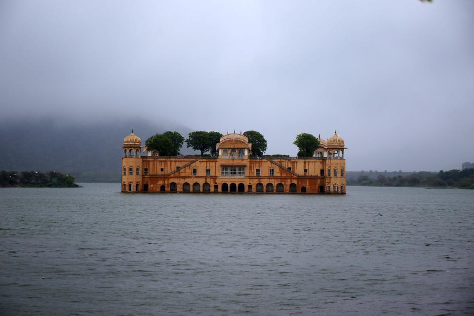 A view of Jal Mahal  covered by clouds during a Rainy day in Jaipur, Rajasthan, India, on May 19, 2021. (Photo by Vishal Bhatnagar/NurPhoto via Getty Images)