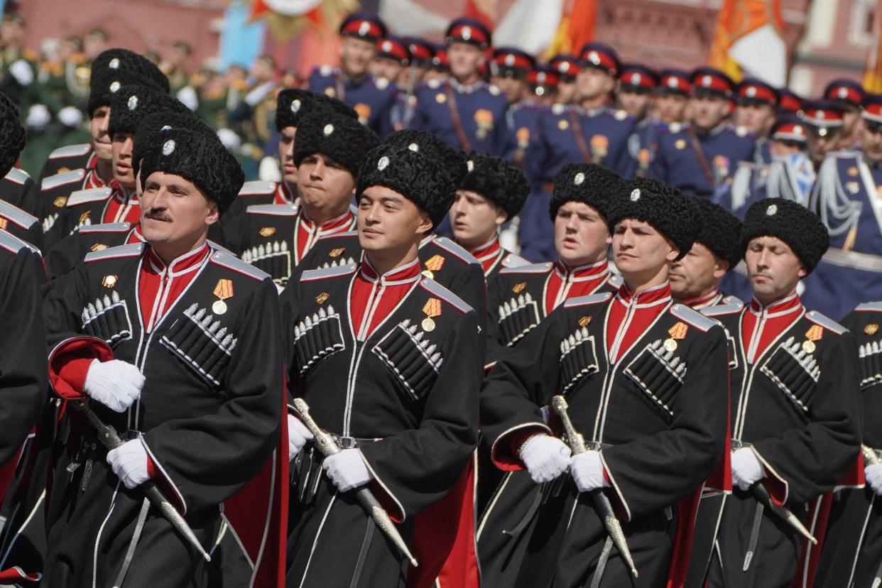 Russian cossacks march in parade (Moskva News Agency/AFP/Getty)