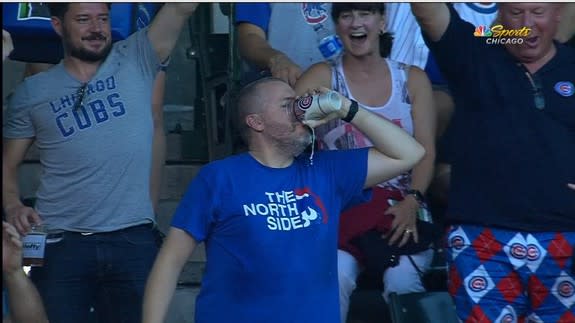 Watch Chicago Cubs baseball fan catching ball in her beer before