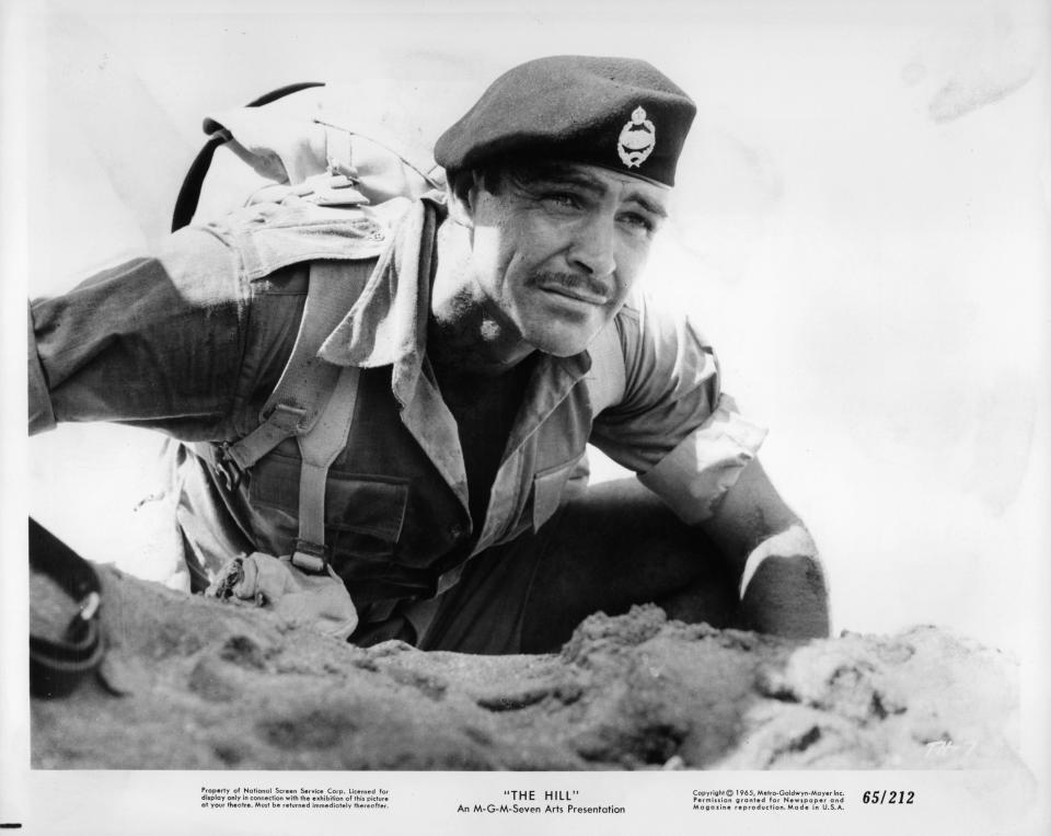 Connery in combat in a scene from the film 'The Hill', 1965.
