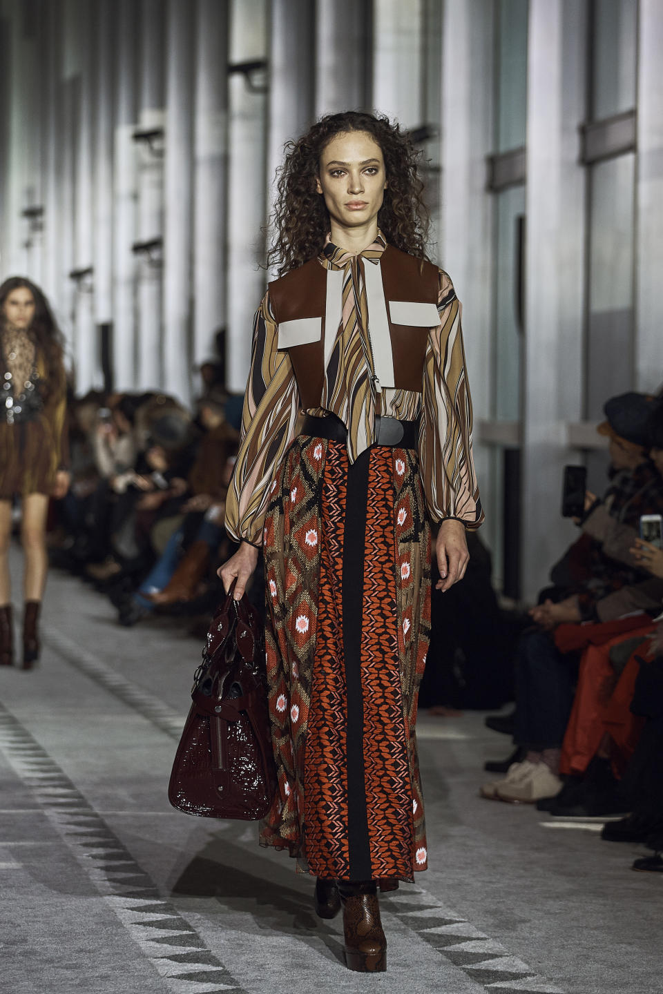 The Longchamp Paris collection is modeled during Fashion Week in New York, Saturday, Feb. 9, 2019. (AP Photo/Andres Kudacki)