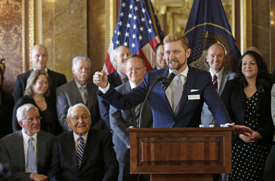 Equality Utah Executive Director Troy Williams (right) speaks after Utah lawmakers introduced a landmark anti-discrimination bill that protects LGBTQ individuals while also carving out protections for the Boy Scouts of America and religious groups during a news conference at the Utah Capitol on March 4, 2015, in Salt Lake City. (Photo: THE ASSOCIATED PRESS)