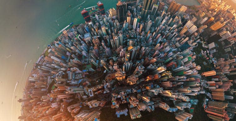 <span class="caption">A planetary force.</span> <span class="attribution"><a class="link " href="https://www.shutterstock.com/image-photo/little-planet-aerial-view-hong-kong-1188792046?src=s4C57TW0i1m2oE04UDKfoQ-1-1" rel="nofollow noopener" target="_blank" data-ylk="slk:Tavarius/Shutterstock.com;elm:context_link;itc:0;sec:content-canvas">Tavarius/Shutterstock.com</a></span>