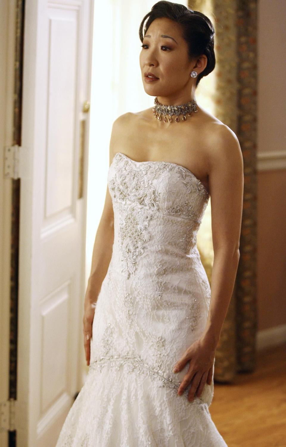 Christina Yang stands in a wedding dress on "Greys Anatomy."