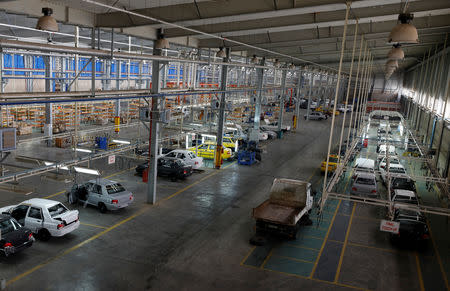 Cars are seen inside the Saipa Syria Factory in the industrial city of Hassia in Homs, Syria September 9, 2018. Picture taken September 9, 2018. REUTERS/Omar Sanadiki