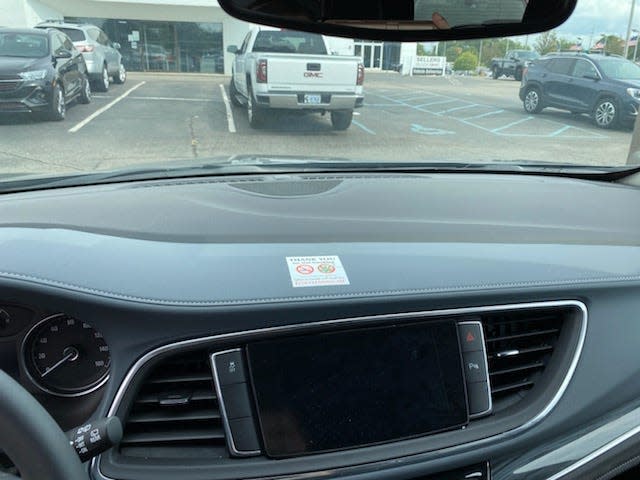 A reminder on the dashboard of a loaner car at Sellers Buick GMC in Farmington Hills to not smoke cigarettes or marijuana inside the vehicle.