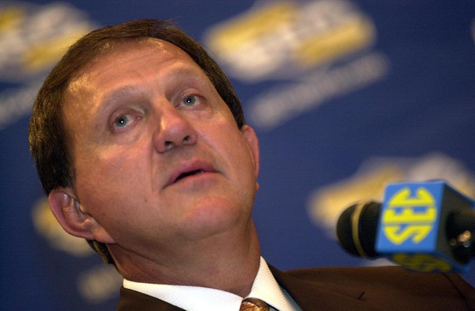 Jackie Sherrill answers questions on Aug. 2, 2001, during the SEC Media Days in Birmingham. Sherrill played college football at the University of Alabama and went on to serve as head football coach at Mississippi State University for 13 seasons.
