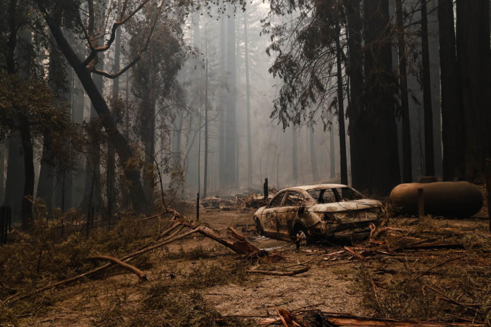 A structure and car near the Big Basin Redwoods State Park Headquarters & Visitor Center is burned down in Boulder Creek, Calif., on Thursday, Aug. 20, 2020.<span class="copyright">Randy Vazquez/MediaNews Group/The Mercury News—Getty Images</span>