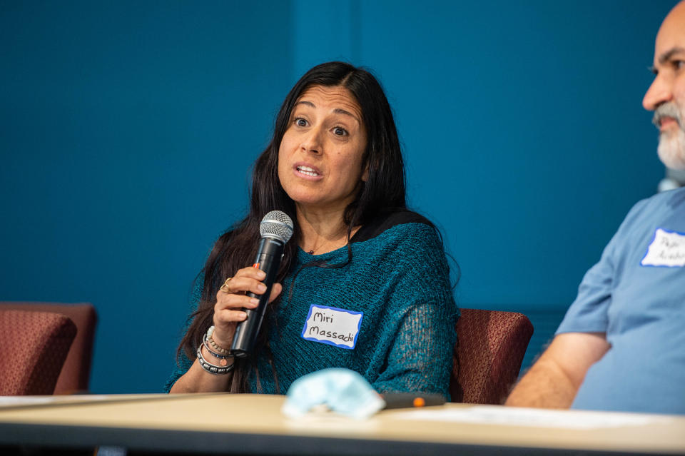 Asheville City Schools Board of Education Candidate Miri Massachi speaks a forum at A-B Tech on April 22, 2022.