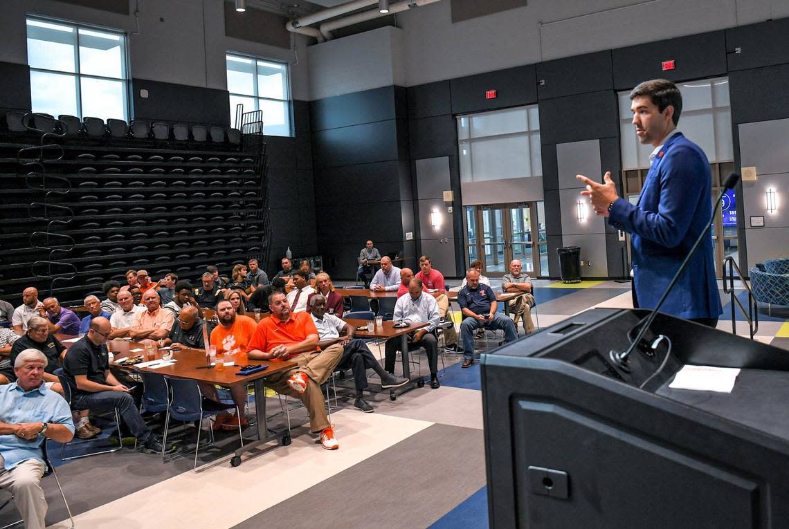 Graham Neff, Clemson University Athletic Director, speak to a crowd of nearly 200 during the Anderson Area Touchdown Club meeting at the Anderson Institute of Technology in Anderson Friday, September 9, 2022. The club honors their picks of top Anderson County High School football players each week and features a guest speaker.