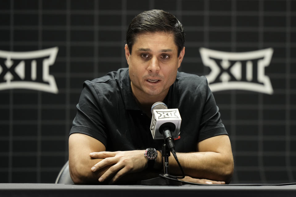 Cincinnati coach Wes Miller addresses the media during the NCAA college Big 12 men's basketball media day Wednesday, Oct. 18, 2023, in Kansas City, Mo. (AP Photo/Charlie Riedel)