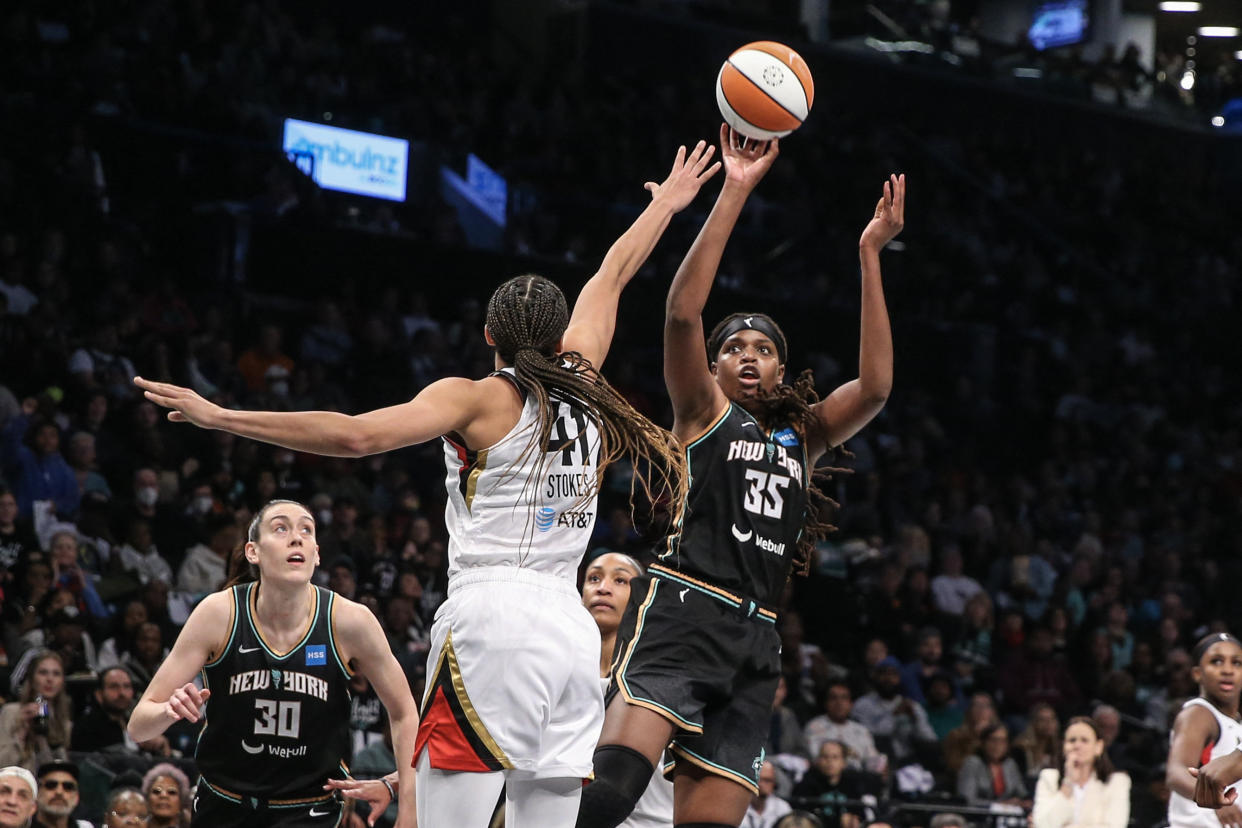 New York Liberty forward Jonquel Jones shoots over Las Vegas Aces center Kiah Stokes in Game 3 of the 2023 WNBA Finals at Barclays Center in New York on Oct. 15, 2023. (Wendell Cruz/USA TODAY Sports)