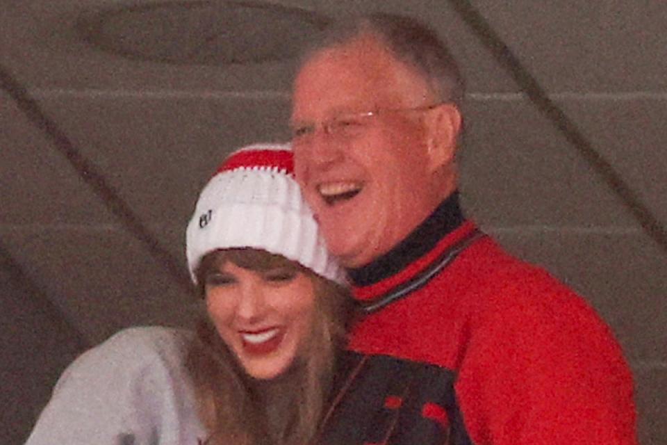 Taylor and her father Scott at a Kansas City Chiefs game in December (Getty)