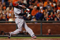 Brandon Phillips #4 of the Cincinnati Reds hits a two run home run in the third inning against the San Francisco Giants during Game One of the National League Division Series at AT&T Park on October 6, 2012 in San Francisco, California. (Photo by Jeff Gross/Getty Images)