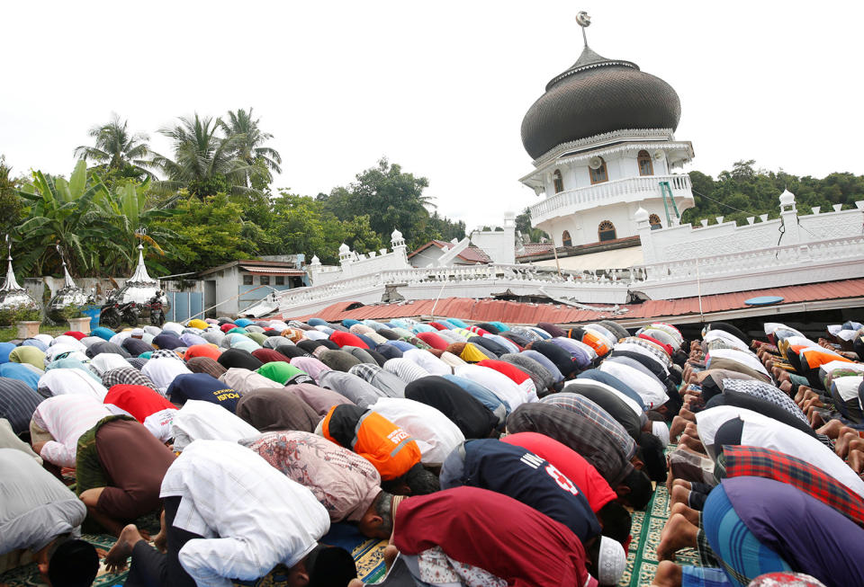 Muslims attend Friday prayers at Jami Quba mosque