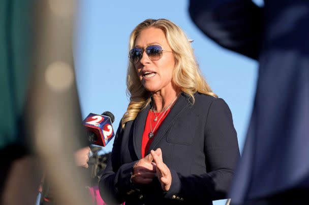 PHOTO: Rep. Marjorie Taylor Greene is interviewed at a rally at Dayton International Airport, Nov. 7, 2022, in Vandalia, Ohio. (Michael Conroy/AP)