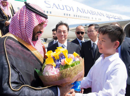 Saudi Arabia's Deputy Crown Prince Mohammed bin Salman (L) is welcomed upon arrival in Beijing, China August 29, 2016. Bandar Algaloud/Courtesy of Saudi Royal Court/Handout via REUTERS