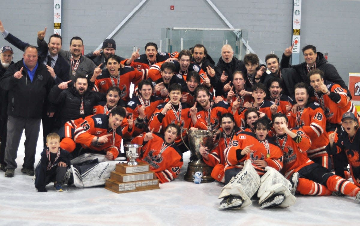 The Soo Thunderbirds celebrate after winning the NOJHL championship Thursday night. The Thunderbirds won 3-2 over Hearst in Game 7 of the NOJHL championship series.