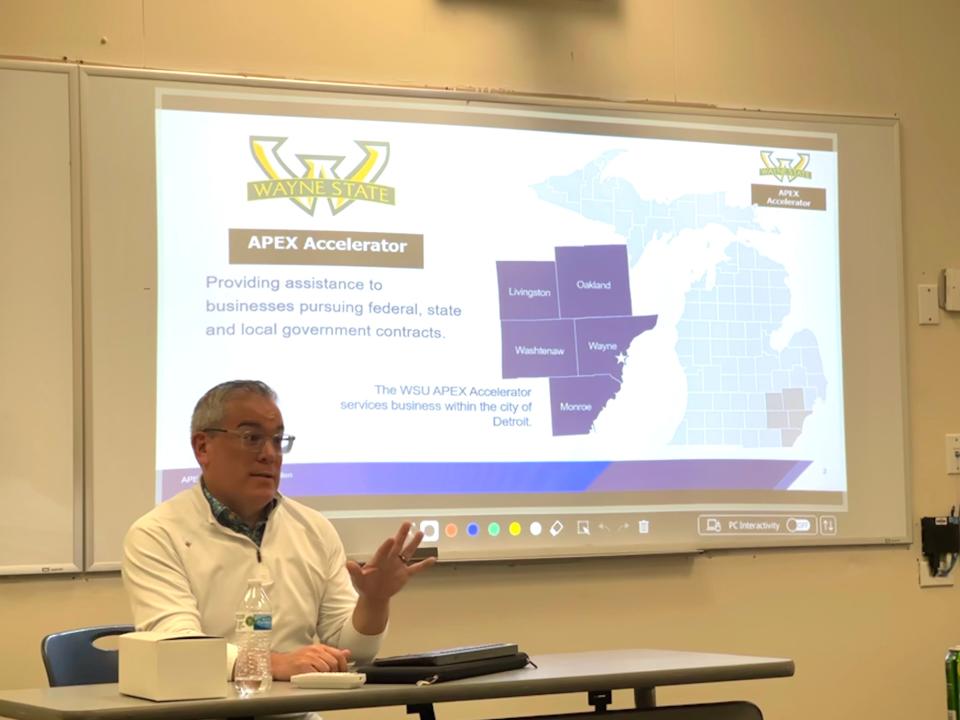 Michael Kelly, the associate director of Wayne State University’s Executive and Professional Development department, presents about the university's Apex Accelerator during the city of Detroit's Minority Business Summit on May 25, 2023.