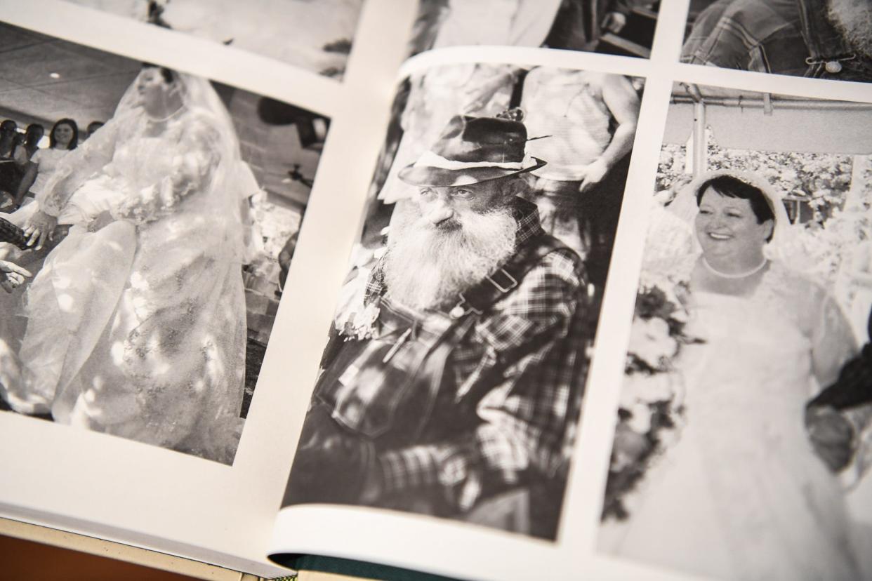 Popcorn Sutton's self-published autobiography, 'Me and My Likker,' features portraits of the late moonshiner and photos from the day he married Pam Sutton, who is working with Ole Smoky Moonshine founder Joe Baker to bring back his original recipes.