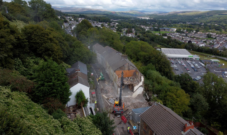 A defiant family has been left with no neighbours after refusing to move from a demolished street.

Mum-of-one Sophie Kendall, 28, grew up in the home that sits in the middle of a terraced row of houses. 

Work has begun to demolish the street after the houses were deemed at risk of a landslip in 2017.

Sophie and her family say they have had no offers from the council since their insurers have that their home is safe.


WALES NEWS SERVICE 


