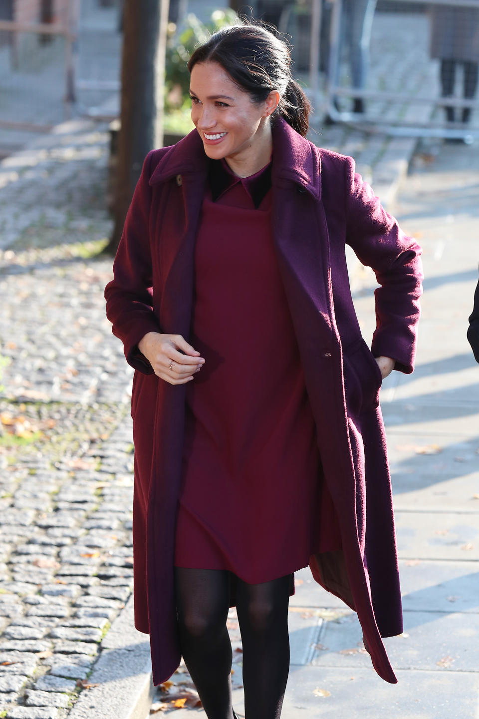 <p>The mother-to-be visited the Hubb Community Kitchen on November 21 to see how proceeds from the Together cookbook are making a difference. For the regal outing, she dressed her bump in a £178 Club Monaco dress with a matching plum-hued coat. <em>[Photo: Getty]</em> </p>