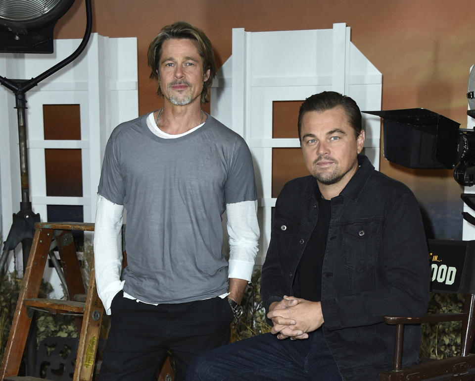 FILE - This July 11, 2019 file photo shows Brad Pitt, left, and Leonardo DiCaprio at the photo call for "Once Upon a Time in Hollywood" in Los Angeles. The film opens on July 26. (Photo by Jordan Strauss/Invision/AP, File)