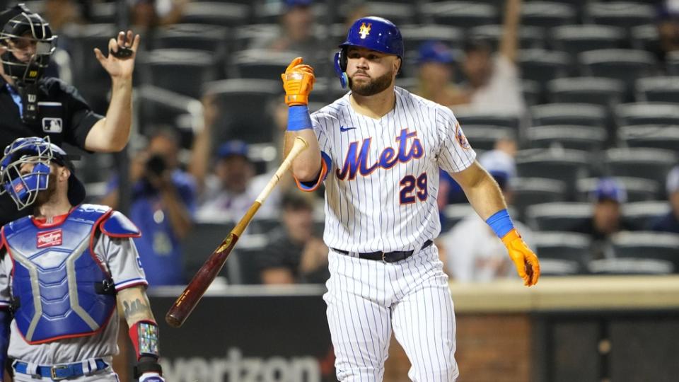 Aug 30, 2023; New York City, New York, USA; New York Mets right fielder DJ Steward (29) reacts to being hit by a pitch with the bases loaded during the tenth inning against the Texas Rangers at Citi Field.