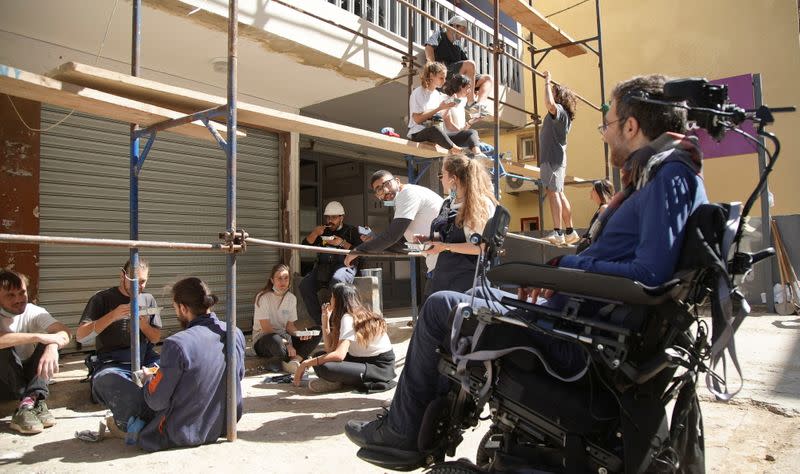 Marc Torbey el Helou, head of Lebanese NGO Offre Joie, talks with volunteers in Beirut