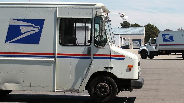 SAN FRANCISCO, CA - AUGUST 12: U.S. Postal Service trucks are seen parked near the loading dock at the U.S. Post Office sort center on August 12, 2011 in San Francisco, California. The U.S. Postal Service is proposing to lay off 120,000 workers in order to deal with an $8.5 billion loss this year that has the agency close to insolvency. The layoffs, if approved by Congress, would take place over the next three years. In addition to layoffs, the Postal Service also wants to eliminate 100,000 jobs through attrition.