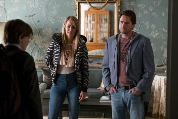 Xandra (Sarah Paulson, middle) and Larry Decker (Luke Wilson). Photo: <em>Macall Polay/Courtesy of Warner Bros. Pictures</em>