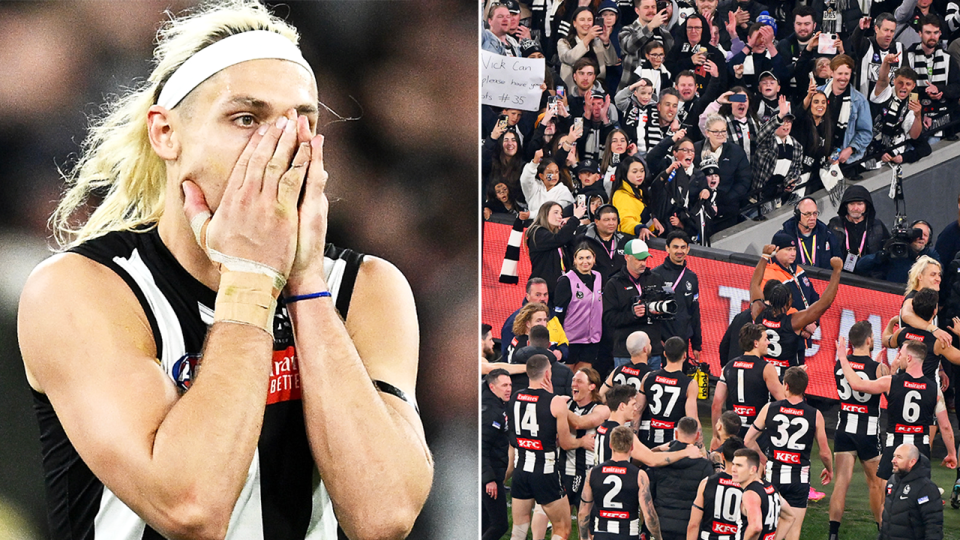 Darcy Moore celebrates and Collingwood members cheer.