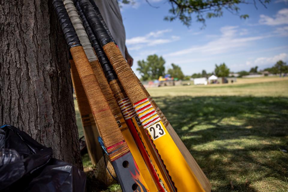 Cricket bats are stacked between matches at the second annual Samoan Heritage Festival in Kearns on Wednesday, July 19, 2023. | Spenser Heaps, Deseret News