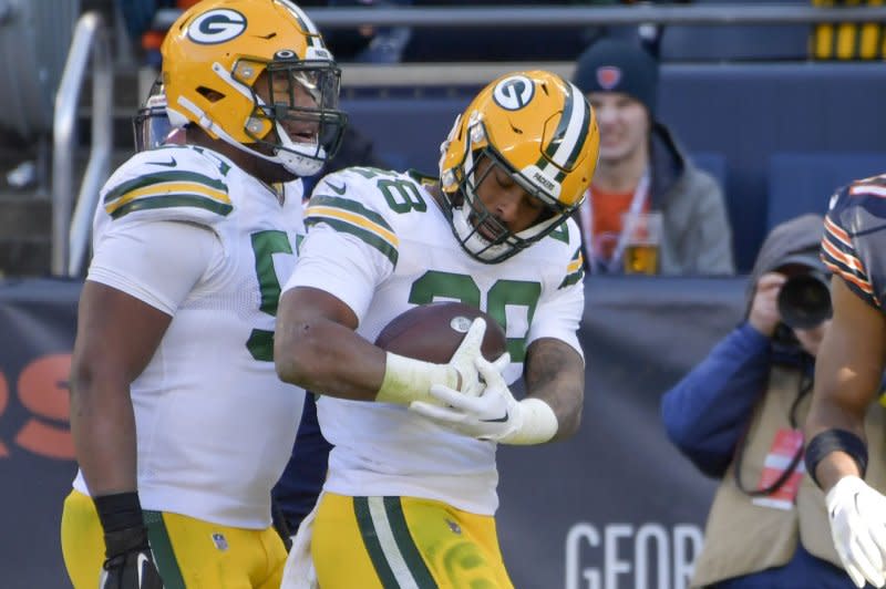 Green Bay Packers running back A.J. Dillon (R) totaled 78 yards from scrimmage on 17 touches in a loss to the New York Giants on Monday in East Rutherford, N.J. File Photo by Mark Black/UPI