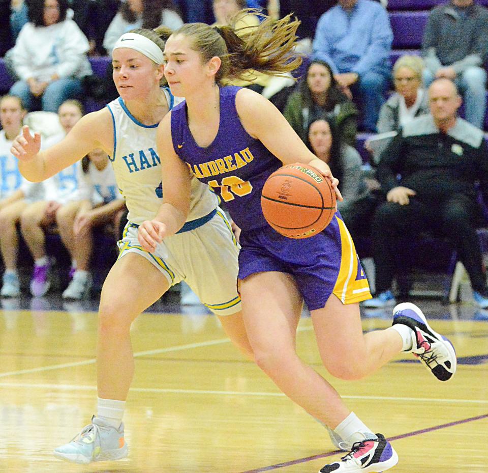 Flandreau's Lily Klein advances the ball against Hamlin's Brooklyn Brandriet during their first-round game in the state Class A high school girls basketball tournament on Thursday, March 9, 2023 in the Watertown Civic Arena.