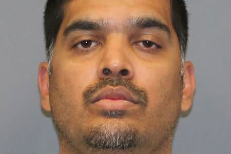 FILE PHOTO: Wesley Mathews, 37, arrested for suspected child endangerment for the treatment of his three-year old daughter after he punished her for not drinking her milk by telling her to stand outside by herself at night near an alley behind her home, is shown in this police booking photo in Richardson, Texas, U.S., provided October 9, 2017 Richardson Police Department/Handout via REUTERS/File Photo