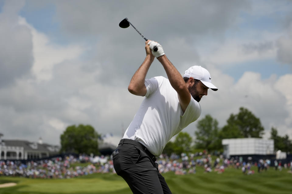 Scottie Scheffler hits his tee shot on the 18th hole during a practice round for the PGA Championship golf tournament at the Valhalla Golf Club, Wednesday, May 15, 2024, in Louisville, Ky. (AP Photo/Matt York)