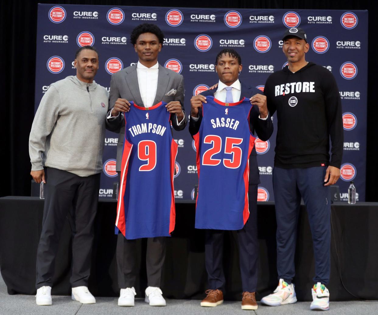 Pistons GM Troy Weaver, left, has made eight first-round picks in his four seasons. The team remains at the bottom of the NBA standings.