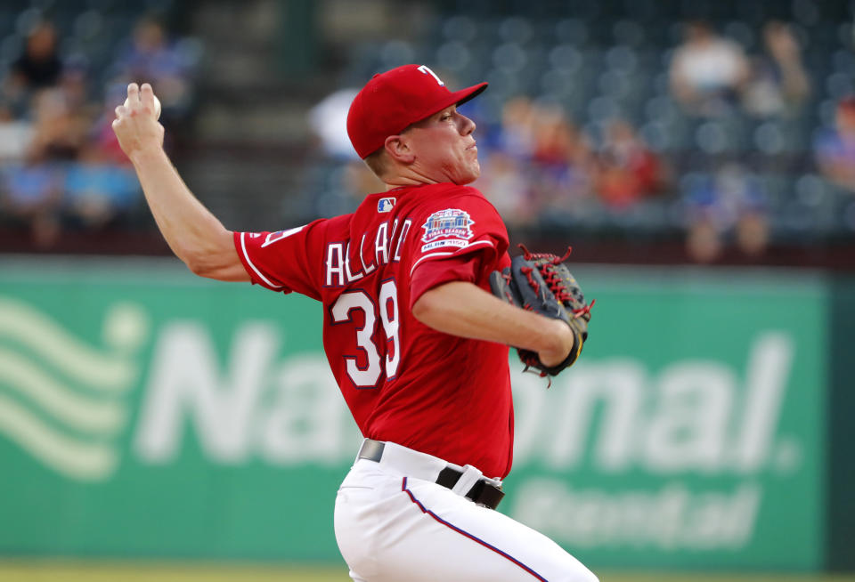 Texas Rangers relief pitcher Kolby Allard throws to the Los Angeles Angels in the first inning of baseball game in Arlington, Texas, Monday, Aug. 19, 2019. (AP Photo/Tony Gutierrez)