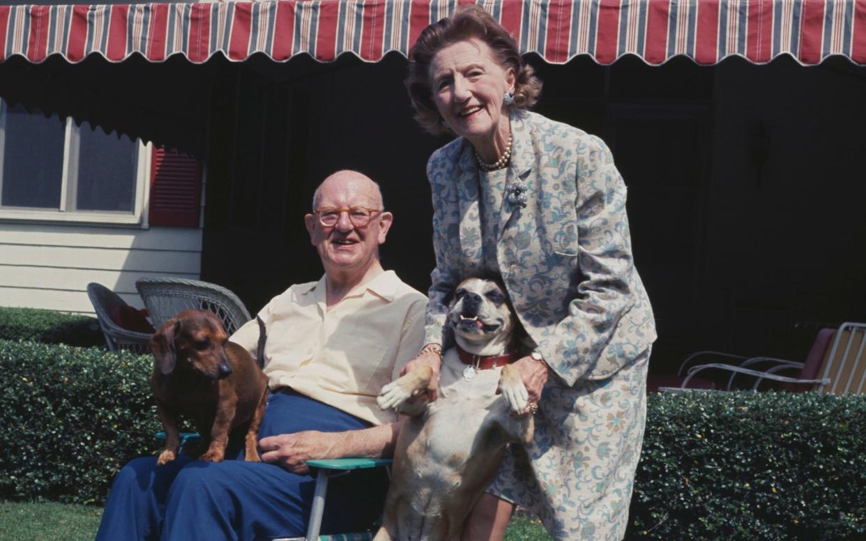 PG Wodehouse with his wife Ethel and their two dogs. The author's works now carry a trigger warning - F Roy Kemp/BIPS/Hulton Archive/Getty Images