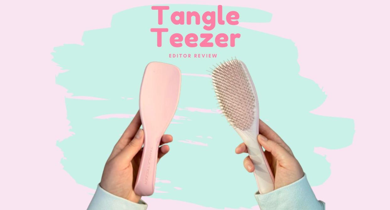 the tangle teezer brush being held