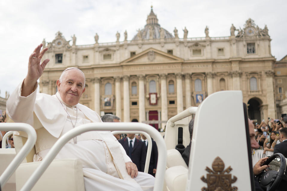 Pope Francis delivers his blessing as he leaves St. Peter's square at the Vatican after celebrating a mass for the canonization of two new saints, Giovanni Battista Scalabrini and Artemide Zatti, Sunday, Oct. 9, 2022. (AP Photo/Andrew Medichini)