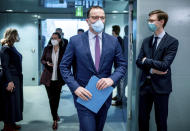 German Health Minister Jens Spahn arrives for the weekly cabinet meeting of the German government at the chancellery in Berlin, Germany, Wednesday, Nov. 25, 2020. (Michael Kappeler/Pool via AP)