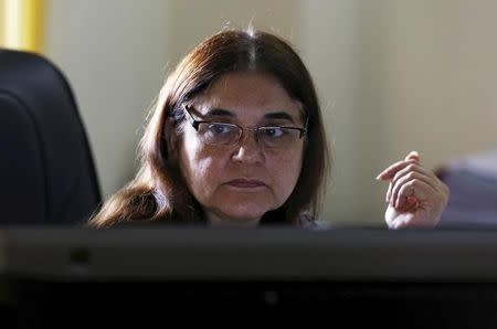 Women and Child Welfare minister Maneka Gandhi, works on a computer before an interview with Reuters at her office in New Delhi, India, October 19, 2015. REUTERS/Adnan Abidi