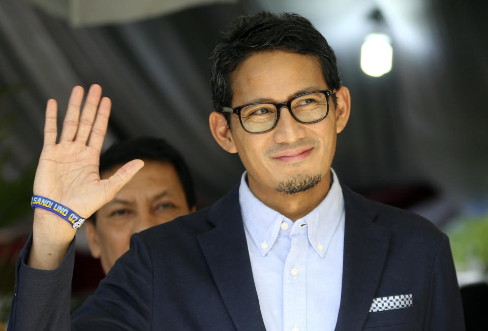 Indonesian vice presidential candidate Sandiaga Uno gestures during a press conference in Jakarta, Indonesia, Friday, May 24, 2019. The defeated candidate in Indonesia's presidential elections has filed a challenge against the result in the country's top court just days after seven people died during rioting by his supporters in the capital. (AP Photo/Achmad Ibrahim)