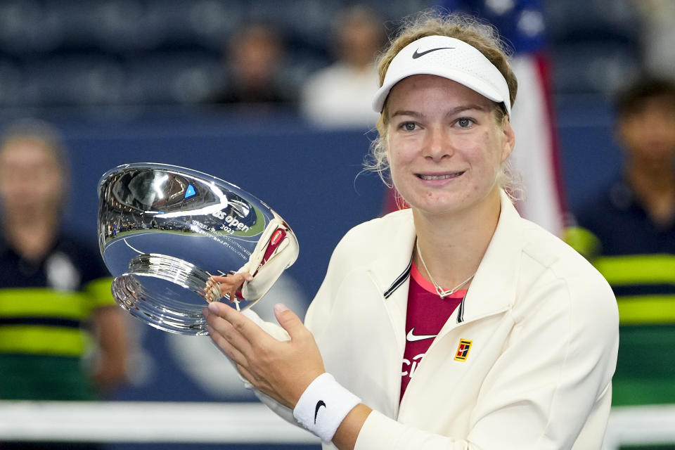 Diede De Groot, of the Netherlands, holds up the trophy after defeating Yui Kamiji, of Japan, in the wheelchair women's singles final of the U.S. Open tennis championships, Sunday, Sept. 10, 2023, in New York. (AP Photo/Frank Franklin II)