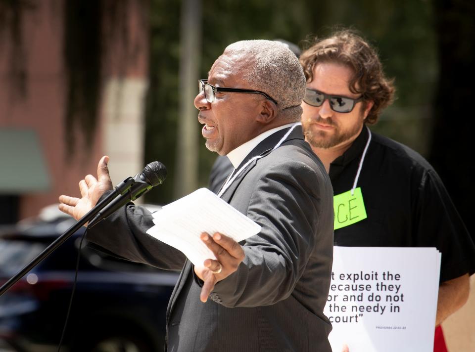 The Rev. Ron Clark of Hurst Chapel A.M.E. Church in Winter Haven addresses fellow members of the Polk Ecumenical Action Council for Empowerment (PEACE) on Tuesday at Fort Blount Park in Bartow. PEACE was calling on local police agencies and the State Attorney's Office to make more use of an adult pre-arrest diversion program for non-violent misdemeanors.