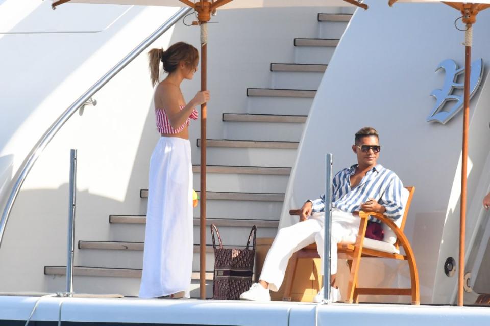 Jennifer Lopez and a friend on a yacht in the Amalfi Coast, Italy, July 28. - Credit: MEGA